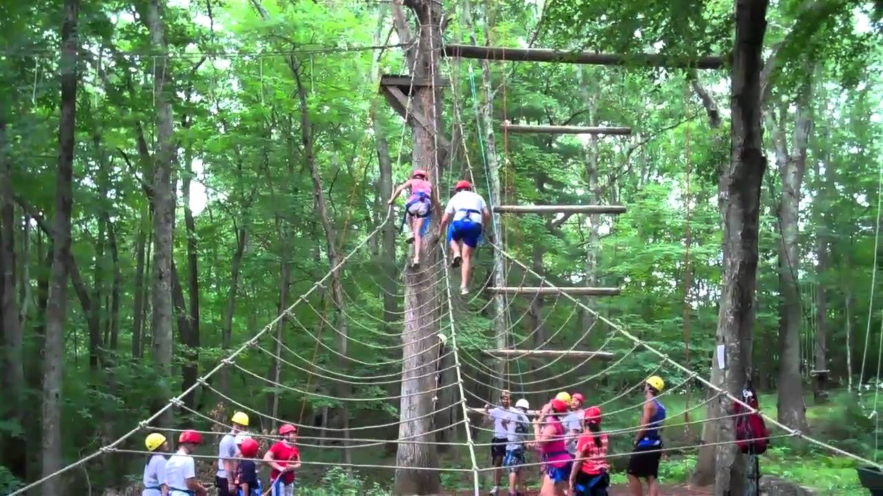 Student on the Alpine Rock Climbing Wall at Holiday Hills
