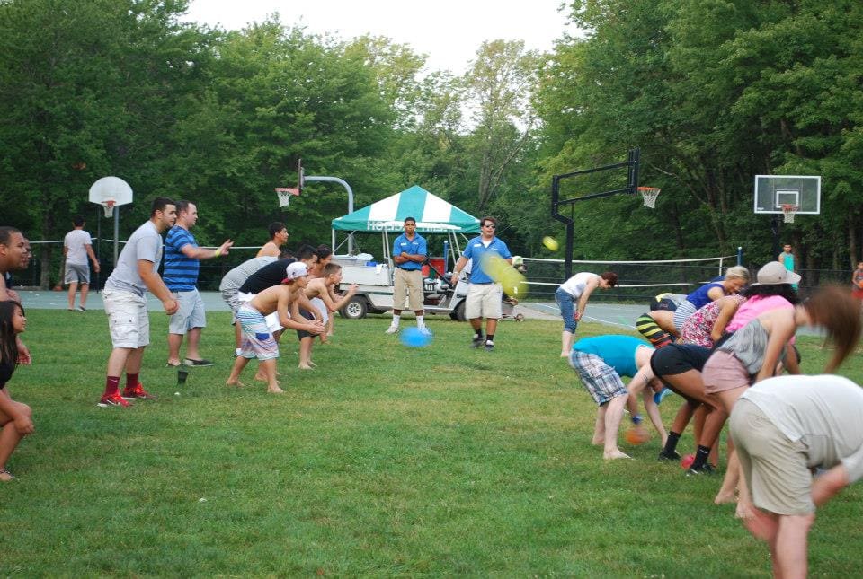 Students enjoying the lake and outdoor activities at Holiday Hills