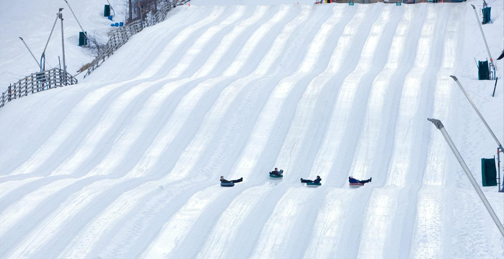 Students snow tubing